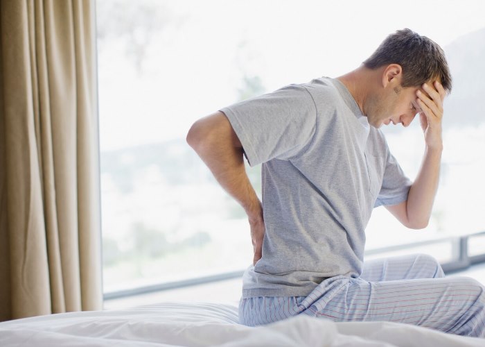 Why is my back pain worse in the morning?