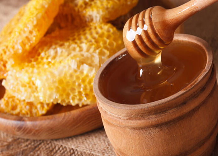 How does honey help a cough?